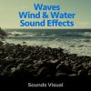 Download track Two Big Waves Break Onto Beach Rocks
