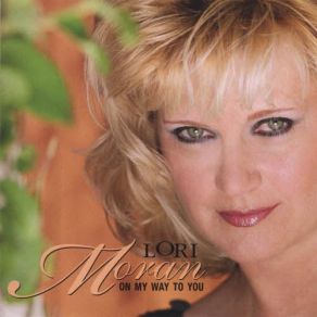 Download track Love Is Here To Stay Lori Moran