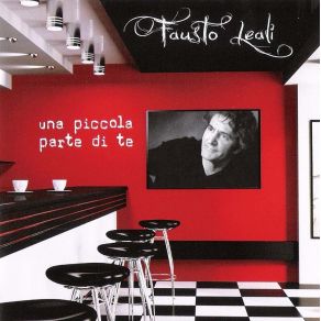 Download track Almeno Tu Nell'Universo Fausto Leali