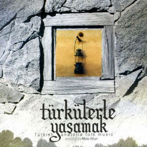 Download track Ela Gözlüm Mete Artun